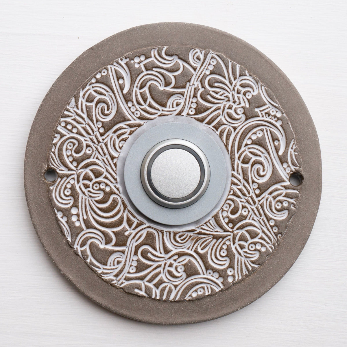 Runde türkisfarbene Keramik-Funkklingel mit goldenem Knopf und geprägtem Blumenornament