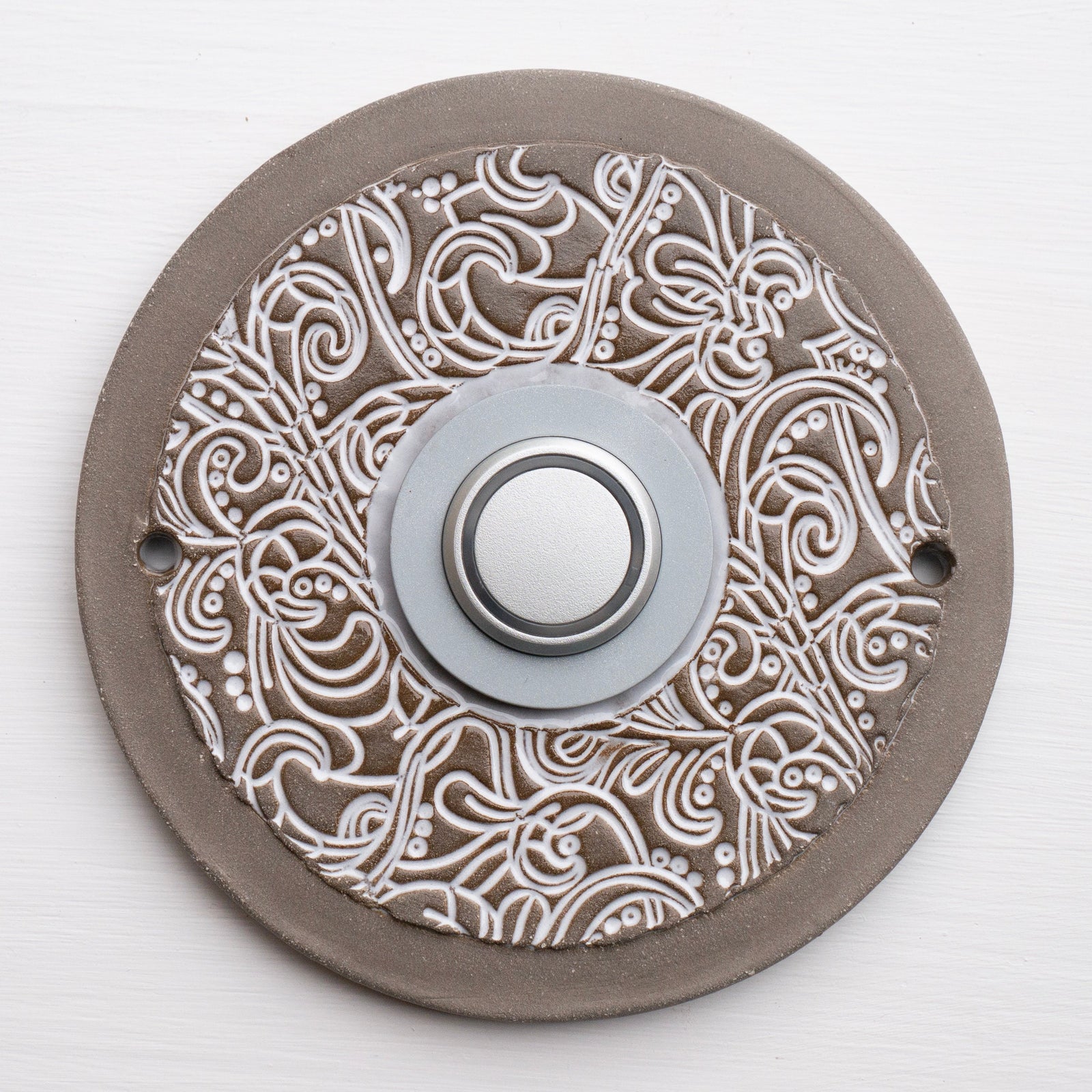 Runde türkisfarbene Keramik-Funkklingel mit goldenem Knopf und geprägtem Blumenornament